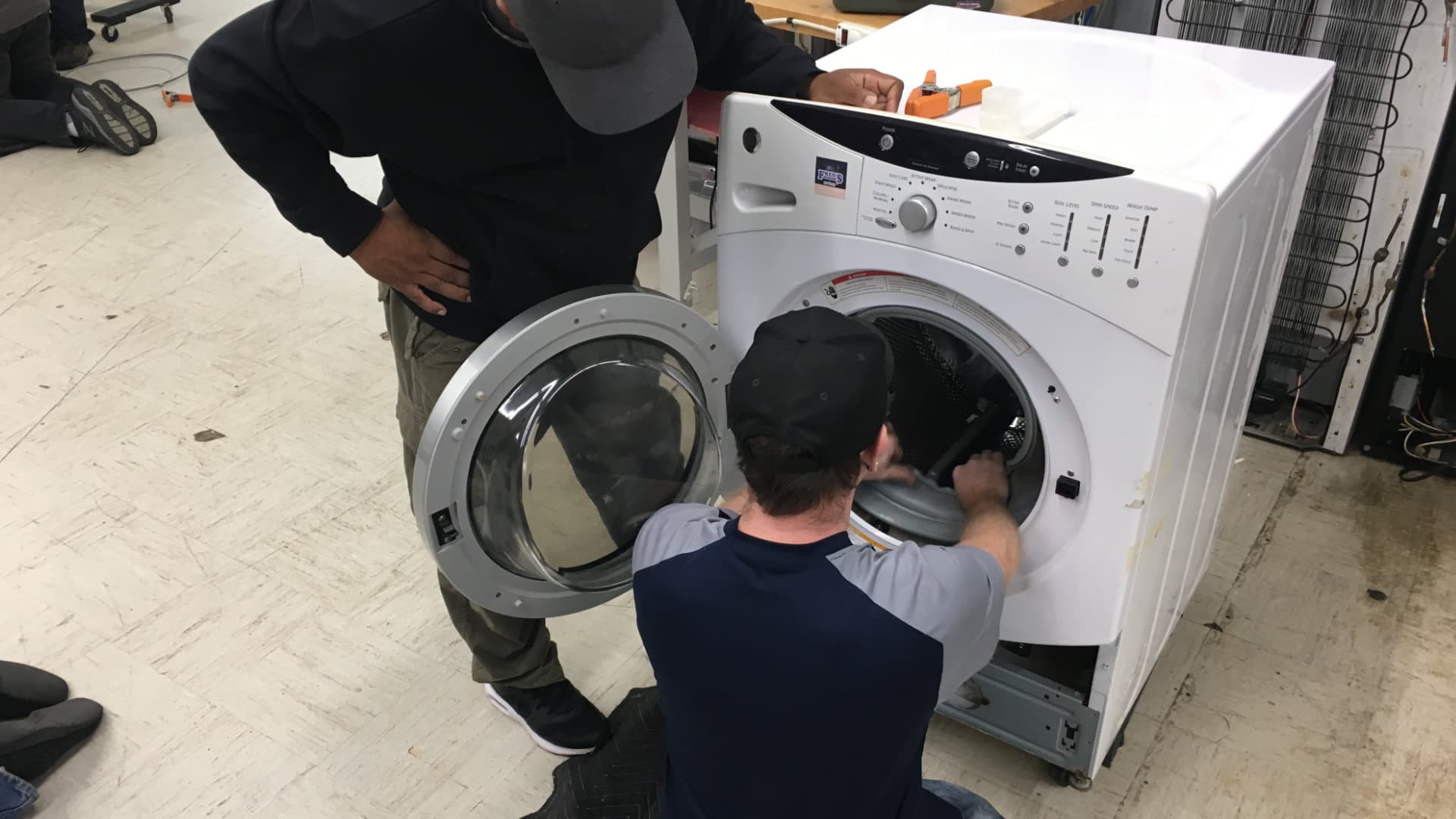 Featured image for “Learning Appliance Repair as a Trade Over Going to College”